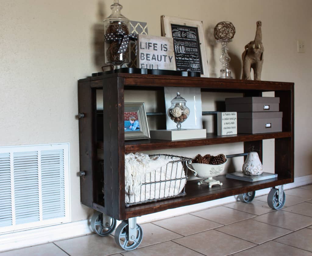 DIY wood and steel console table with glass vases and inspirational signs and other farmhouse decor