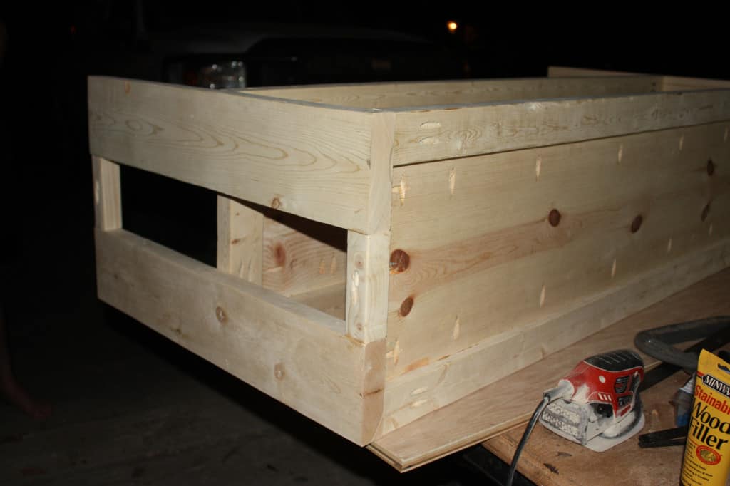 unfinished wood console table being built