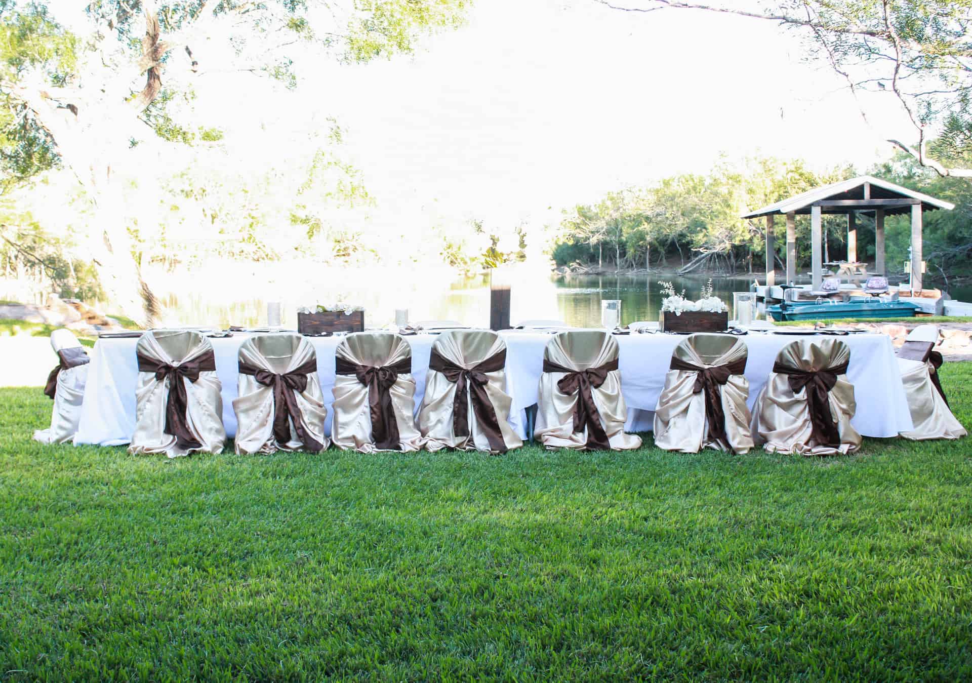 Table set for the 60th anniversary party - wooden boxes decorate the table