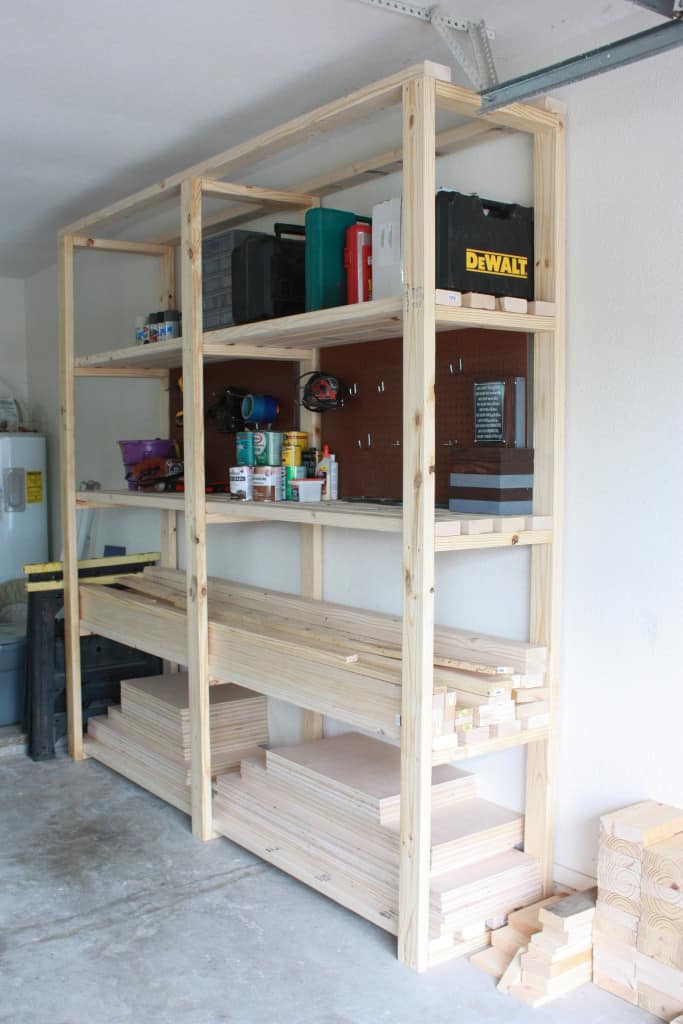 Garage Storage Shelves with boards and tools on it