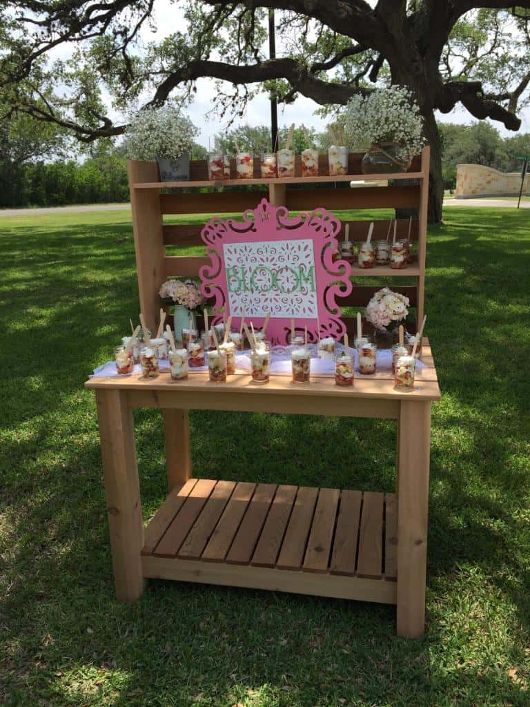 Potting Table set up as an outdoor island to serve the parait sitting on it