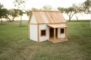 DIY Doghouse - the cutest white and cedar doghouse with free build plans