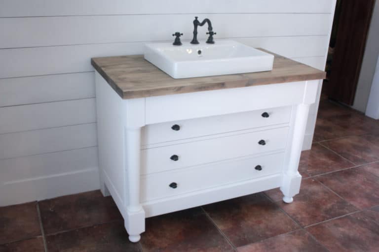 Farmhouse DIY bathroom vanity - dresser vanity white with wood top