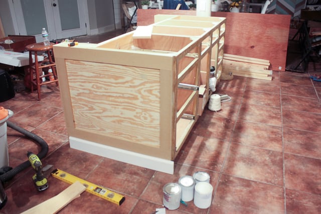 Kitchen Island Makeover - adding molding to the kitchen island in progress shot