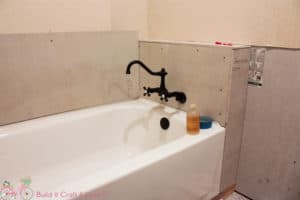Plumbing fixes and Bathtub Install - One Room Challenge - Week 4