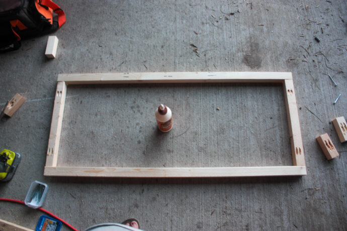 building the wood vent hood for kitchen by attaching 2x2s with pocket holes