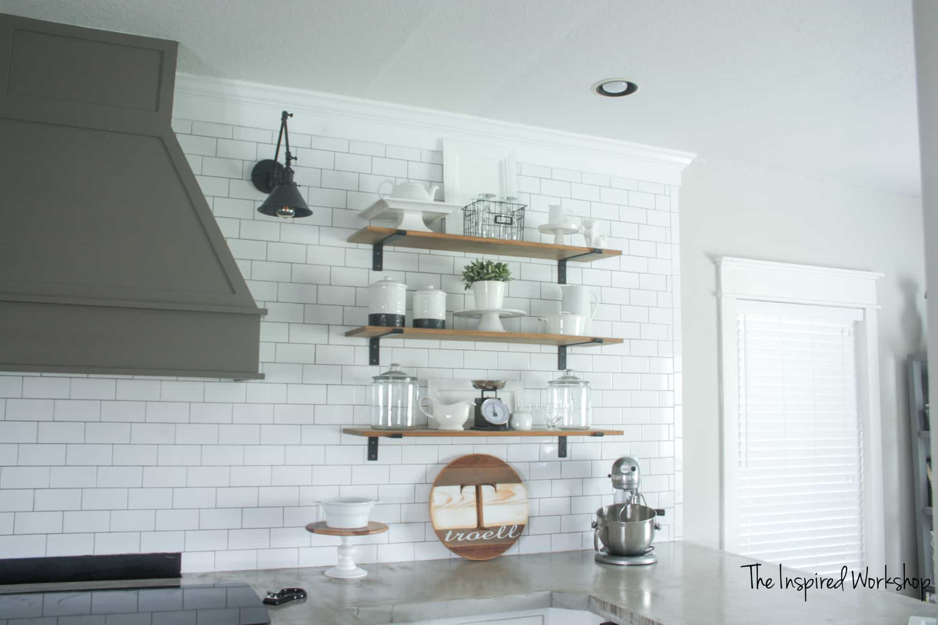 Kitchen Remodel with open shelving and subway tile wall