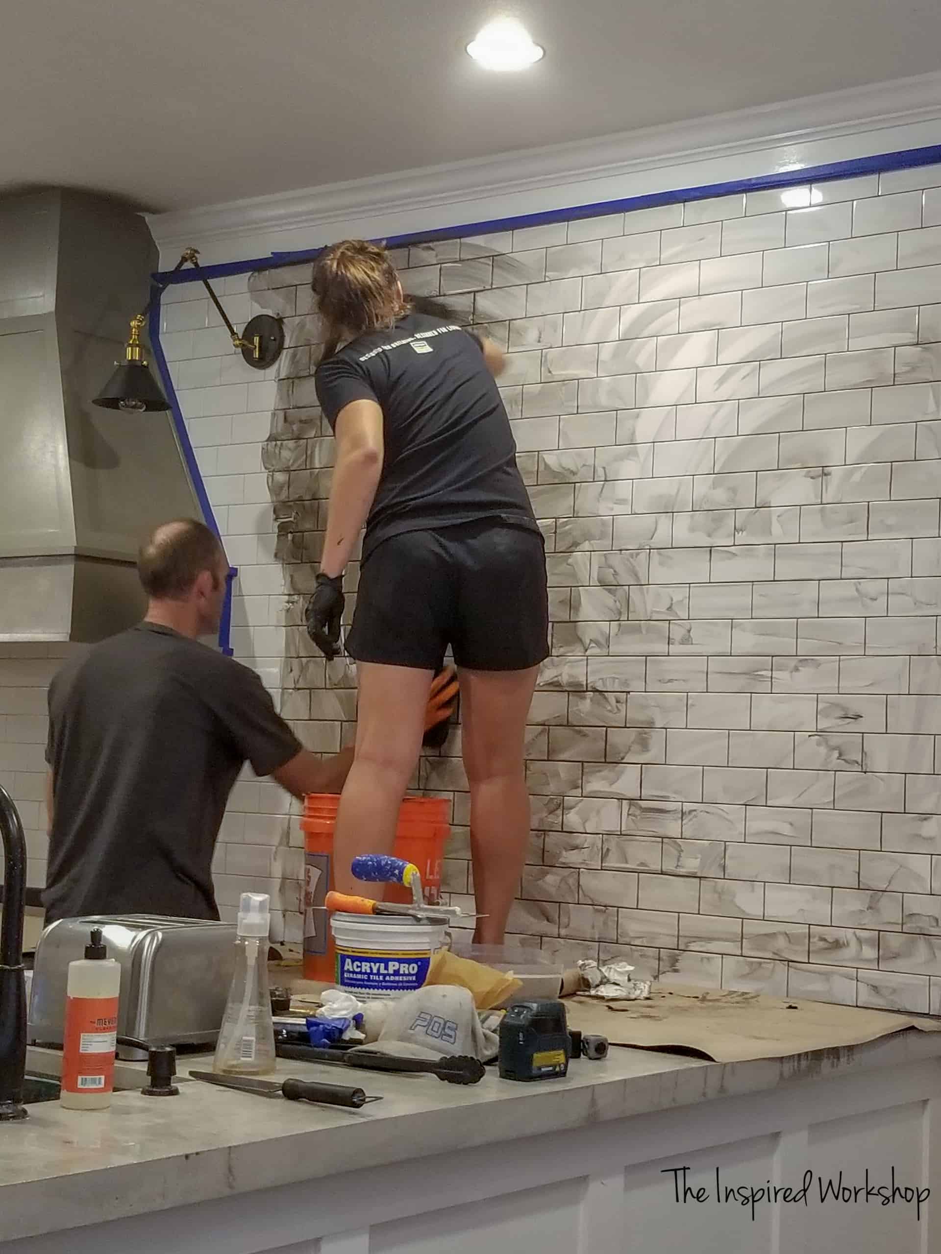 Grouting a kitchen wall