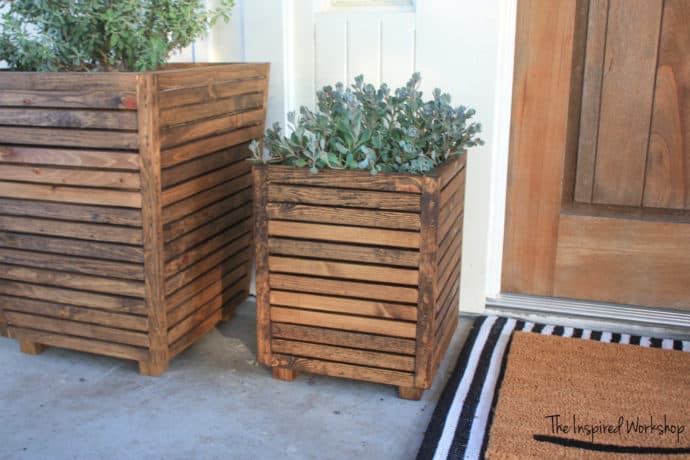 DIY Outdoor Planter sitting by the front door with a larger planter to its left