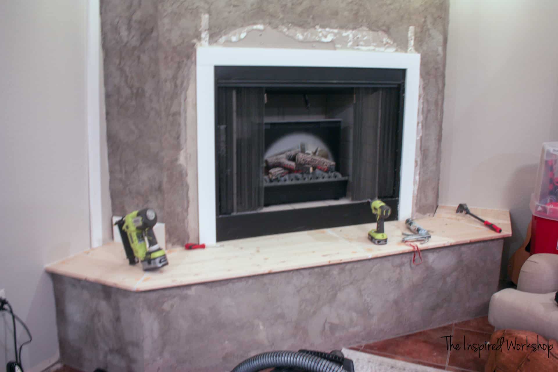 covering the cement hearth with wood