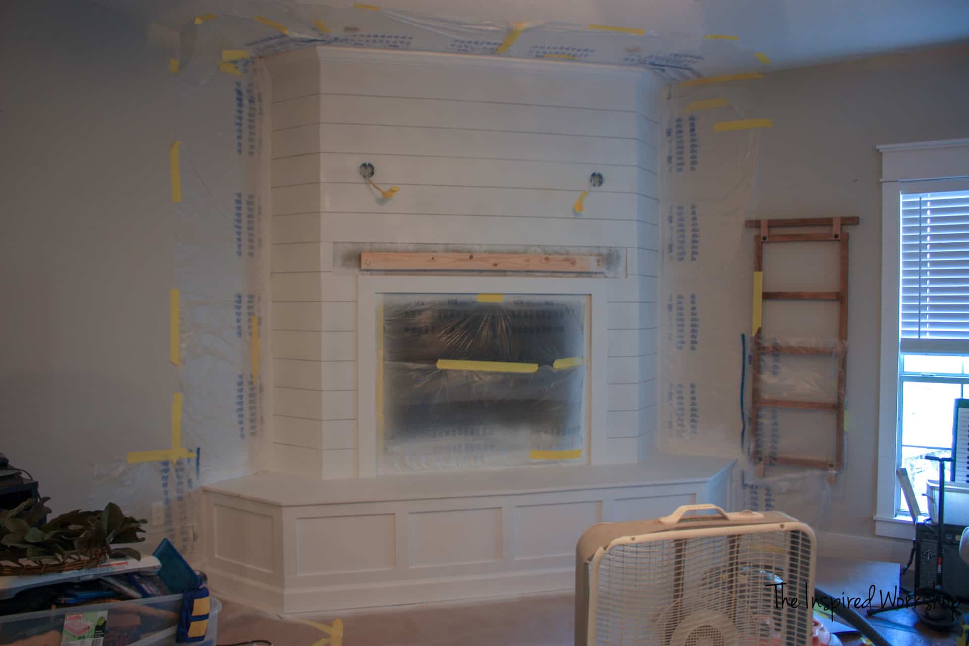 Fireplace Makeover - Primer sprayed