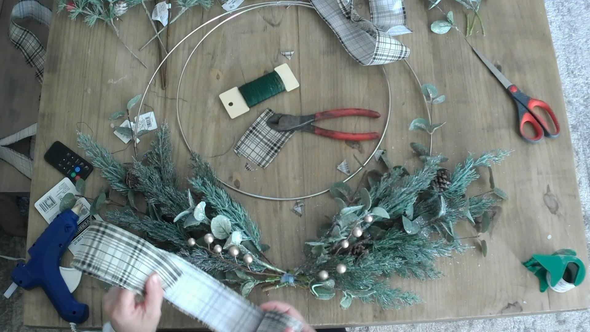 MAking the bow for the DIY CHristmas wreath