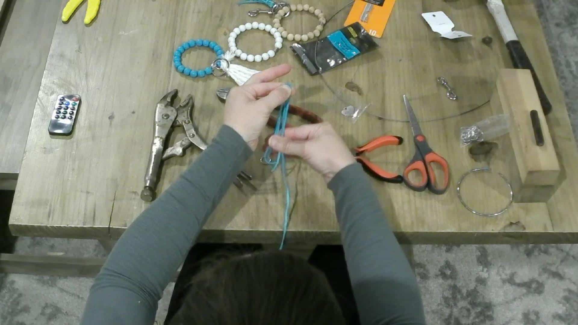 Making the tassels for the DIY key chain bracelet