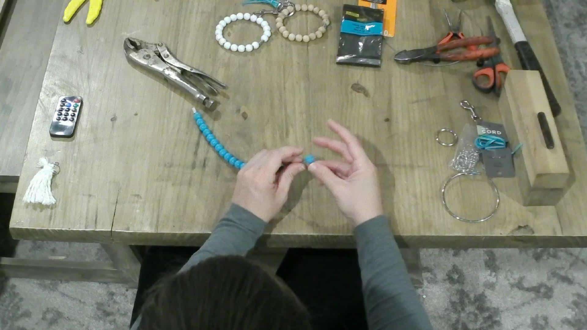 Stringing the Beads onto the key chain bracelet