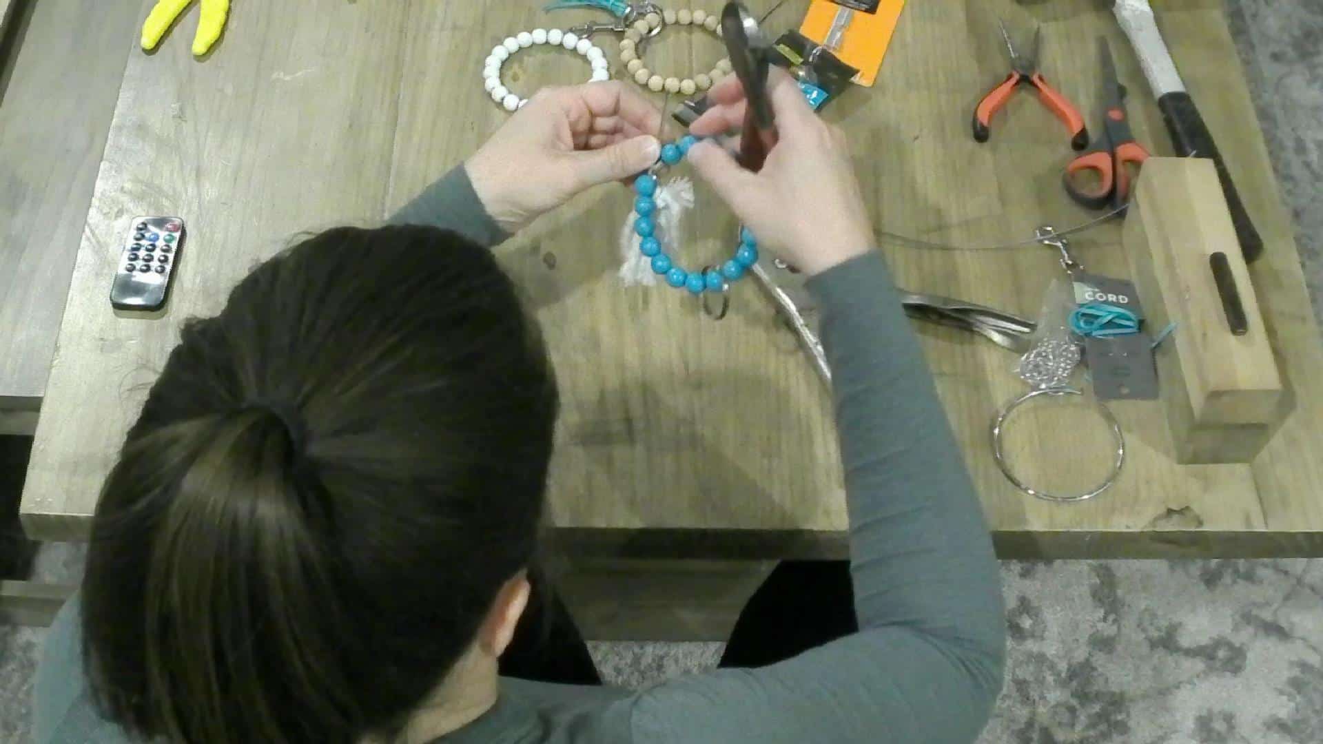 Making the DIY keychain bracelet