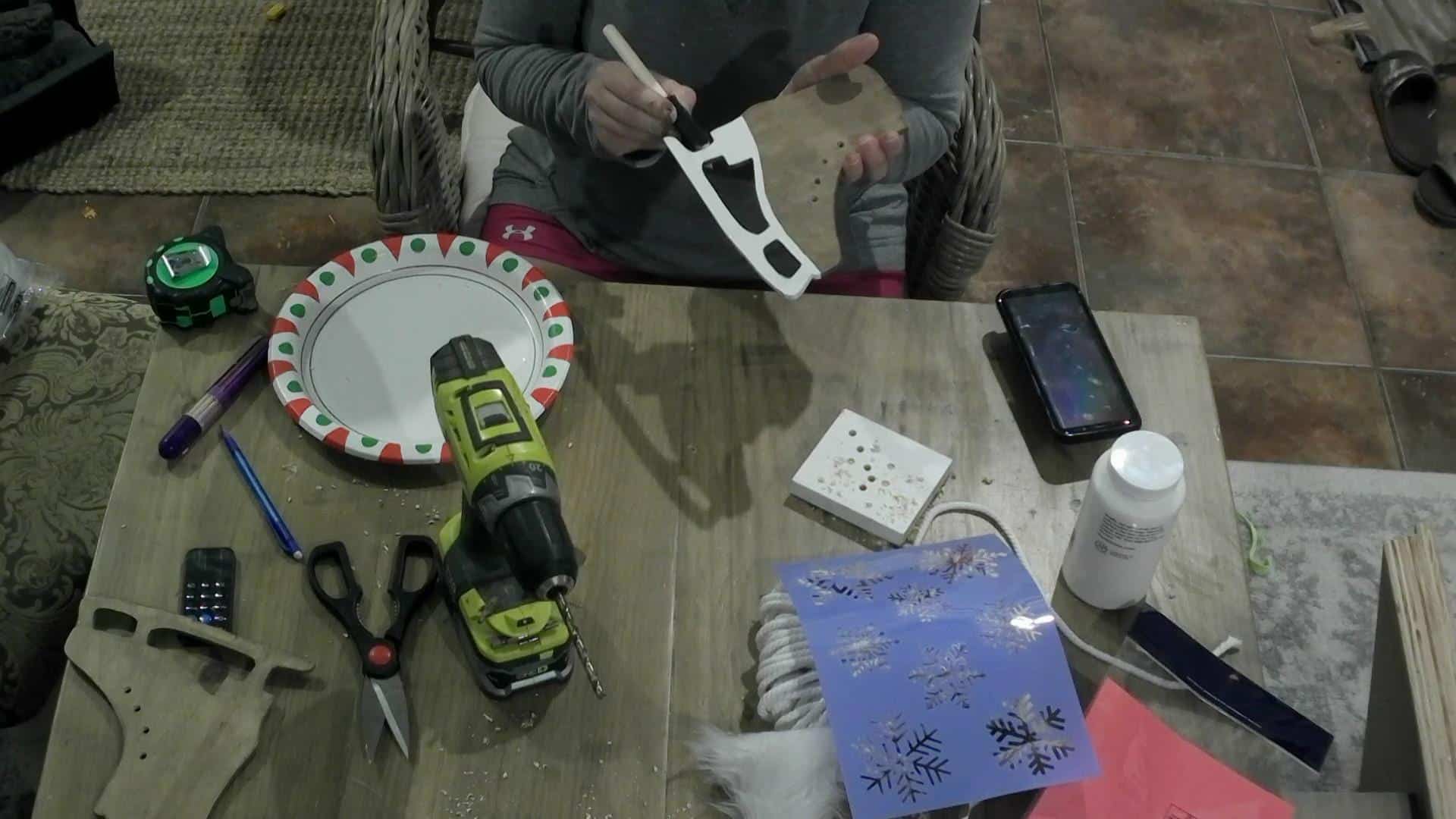 DIY Ice skate Decor - painting the white accents on the skates