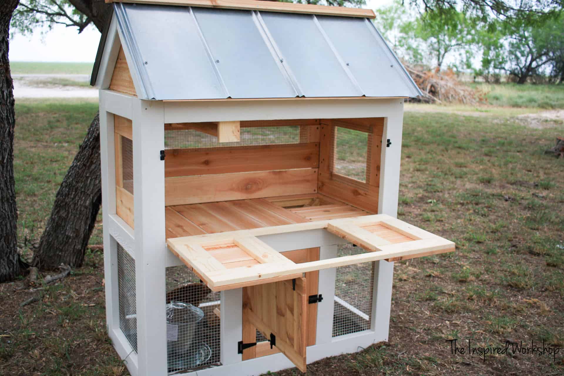 Small Chicken Coop with the large door folded down to show how easy it is to clean