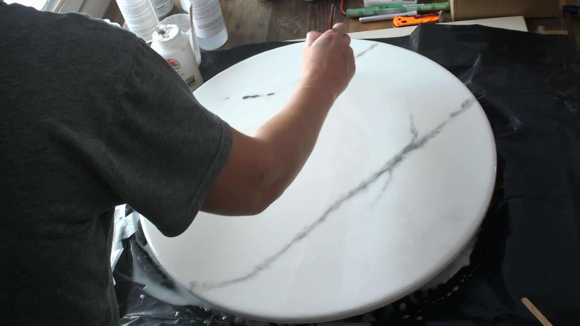 Adding more veins to the epoxy marble table top