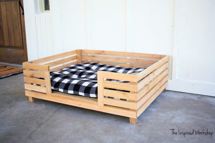 Bed frame with outlet built in dog bed