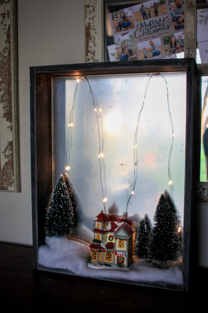 Showing the lights in the DIY Christmas shadow box