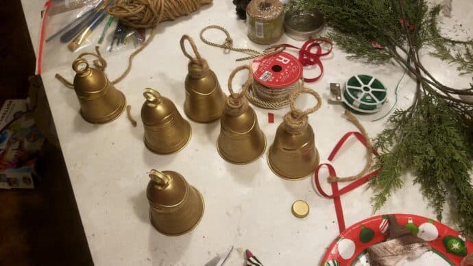 Bells waiting to be hung by the fire with care