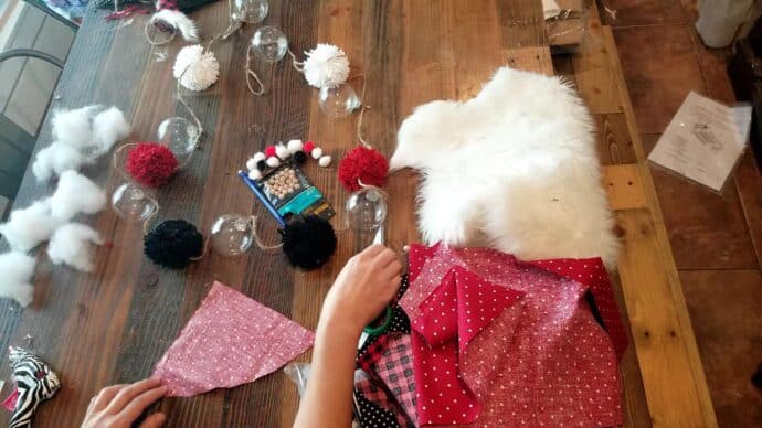 making the hat for the gnomes on the garland