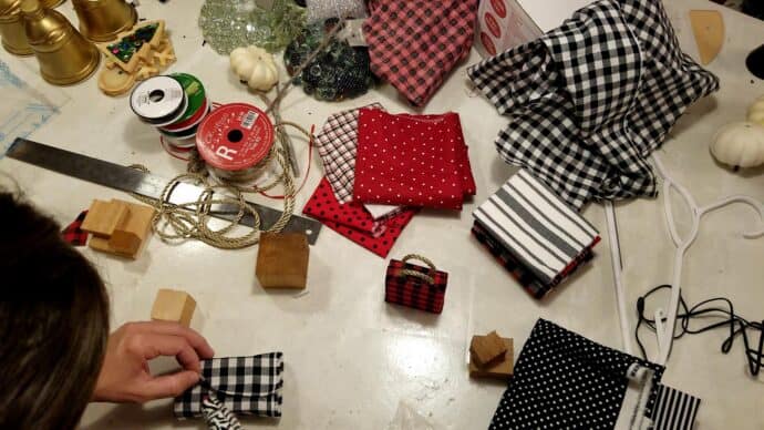 Wrapping the scrap wood in fabric to look like a gift box - and then turn it into an ornament