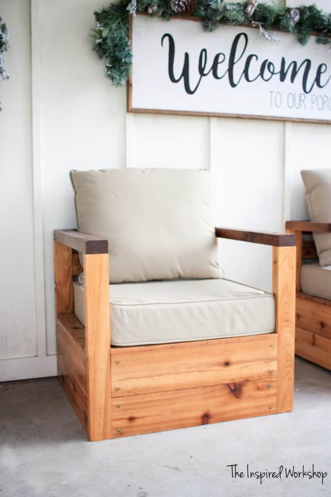 DIY Patio Chiar with tan cushion and welcome sign above the chair