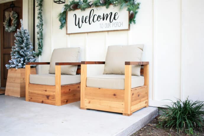 DIY Patio Chairs - with welcome sign above the chairs, christmas tree in planter to the left of chairs