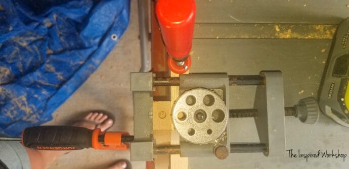 Drilling the dowel holes on the base of the small side table