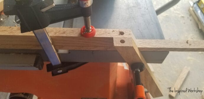 Drilling dowel holes for the base of the small side table