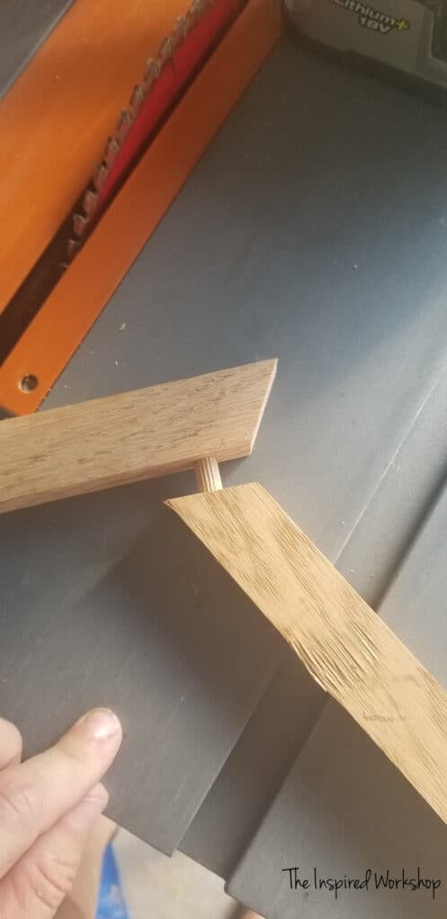 drilling the dowel holes for the base of the small side table