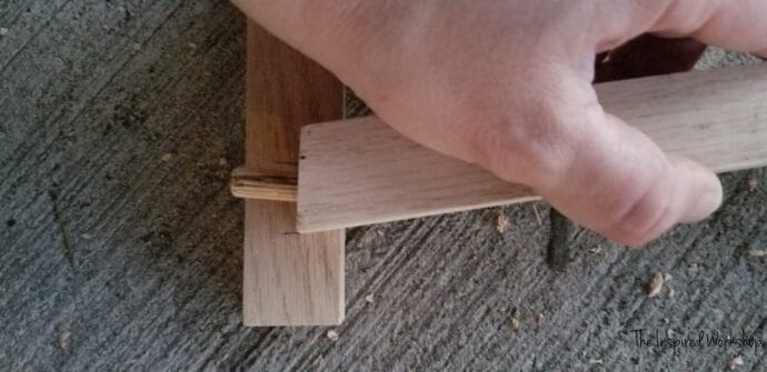 marking where to drill the dowel holes on the table base