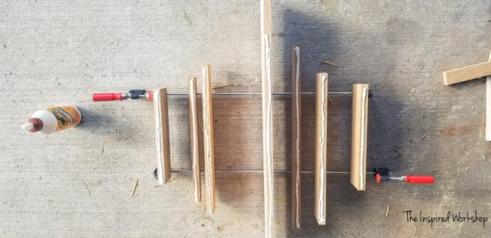 putting the glue on the boards to glue up the table top