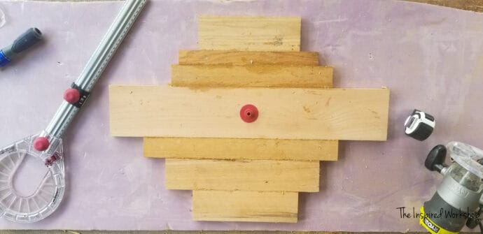 Setting up the circle jig to cut the table top for the small round side table