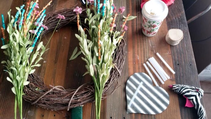 making the spring wreath, the flowers are bunched up as I want them placed on the wreath