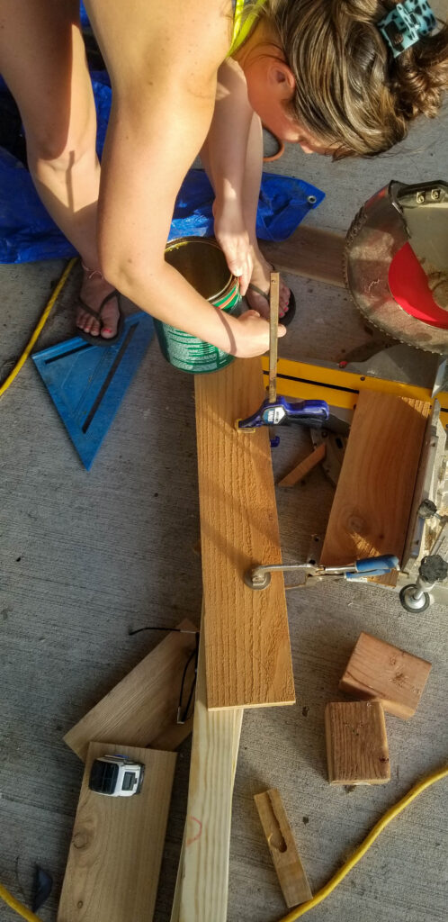 tracing a paint can to make decorative edge cuts on the trellis