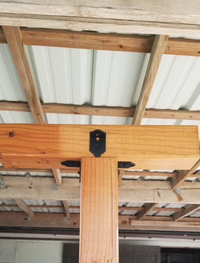 ornamental rafter clip shown for attaching the 2x3