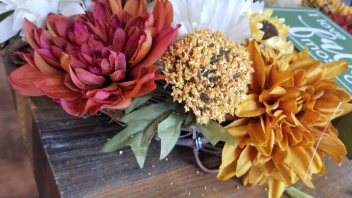 up close of the flowers on the fall grapevine wreath