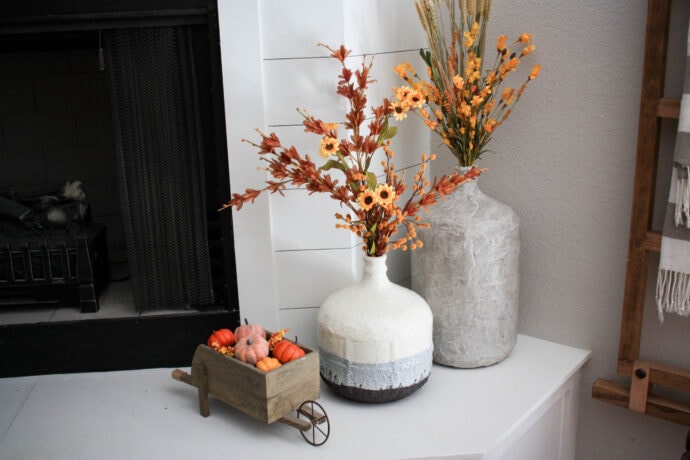 vases made to look like stone with joint compound and baking soda paint