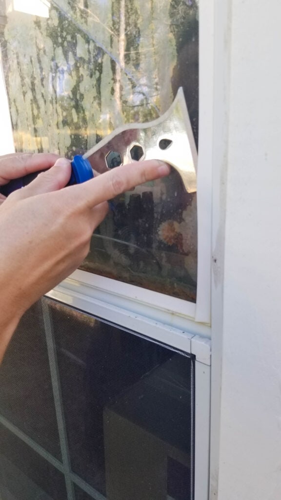 prying the glazing bead to replace the window glass