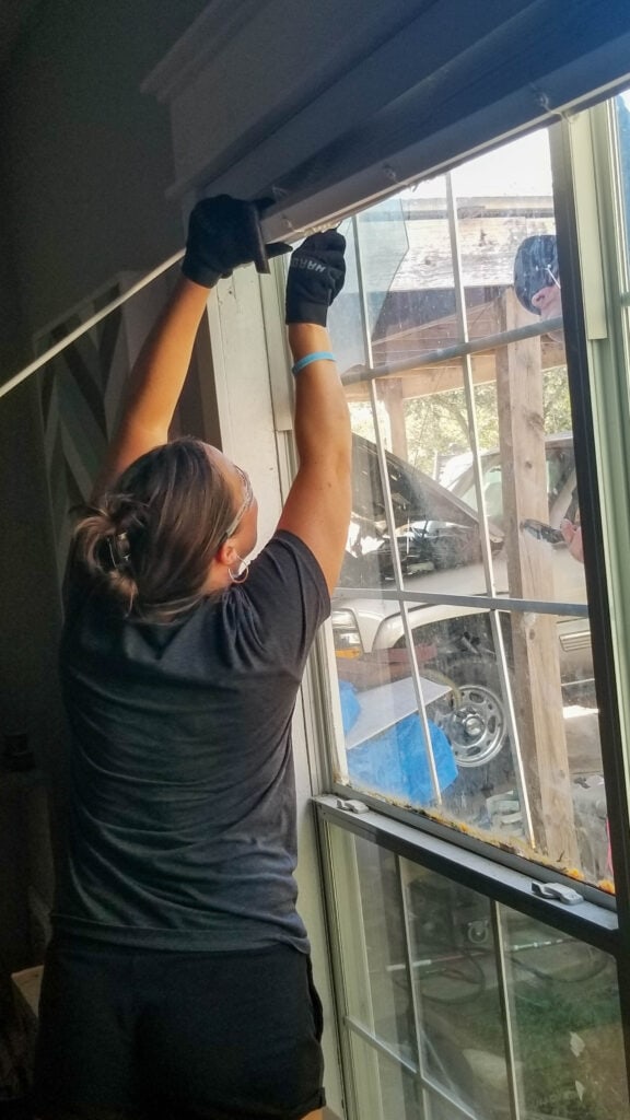 cutting through the glass bedding to remove window glass