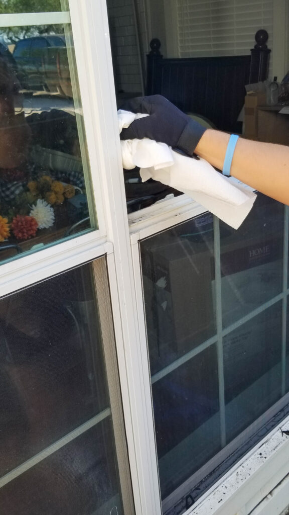 wiping the window glazing bead lip with isopropyl alcohol