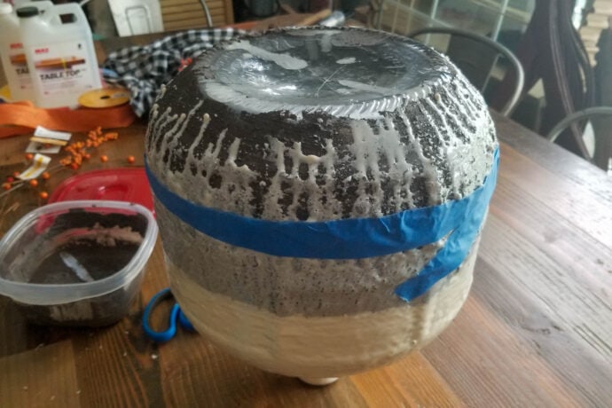 painting over the epoxy drips on the faux stone vase