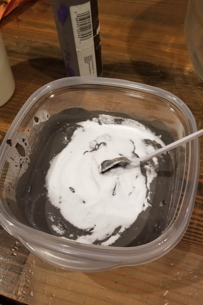 mixing baking soda into paint for stone effect