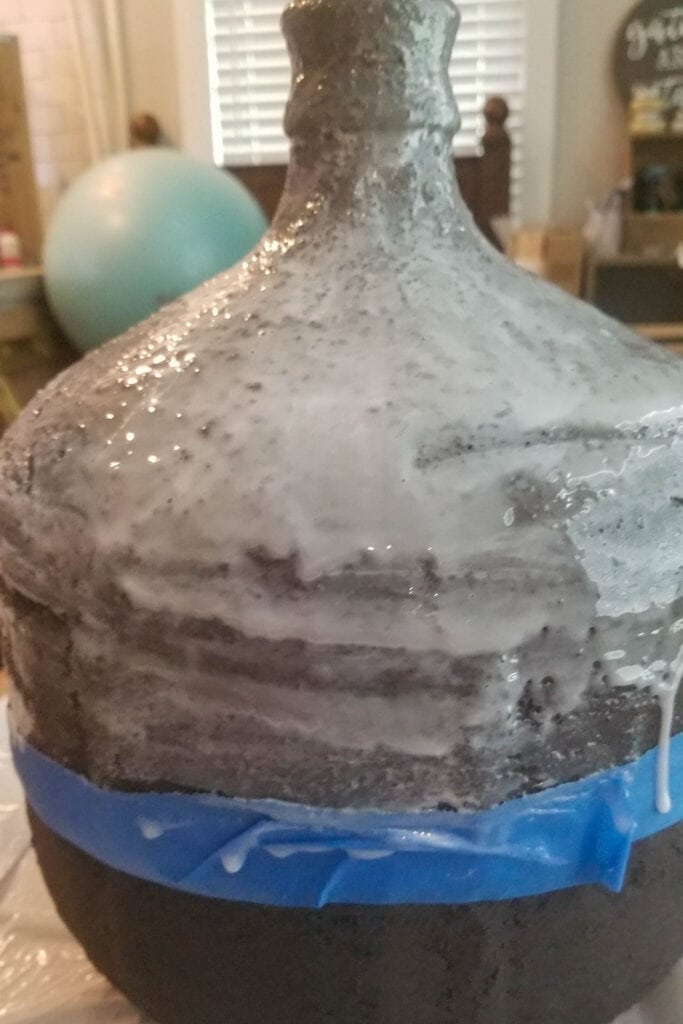 epoxy poured on top part of faux stone vase