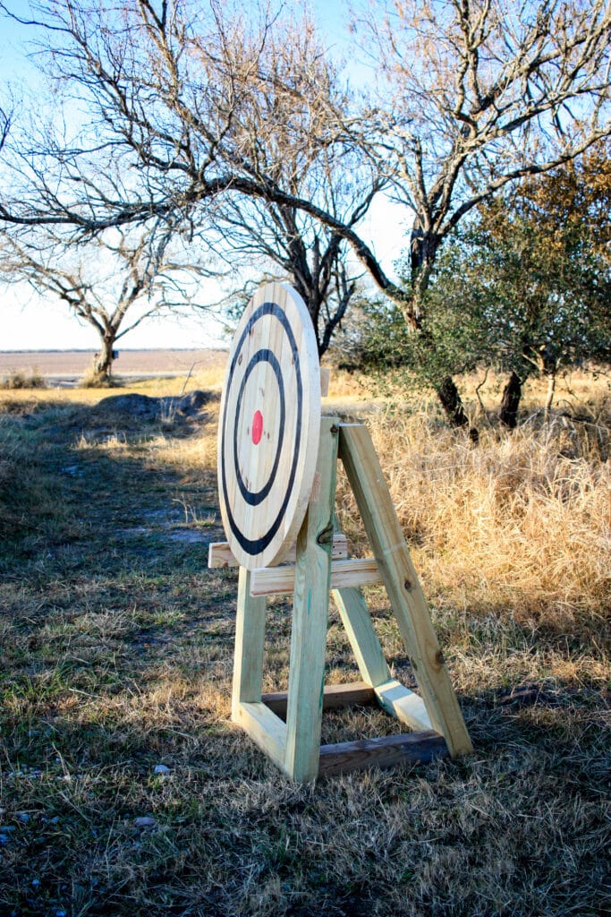 handmade axe throwing target sitting outside ready to be used