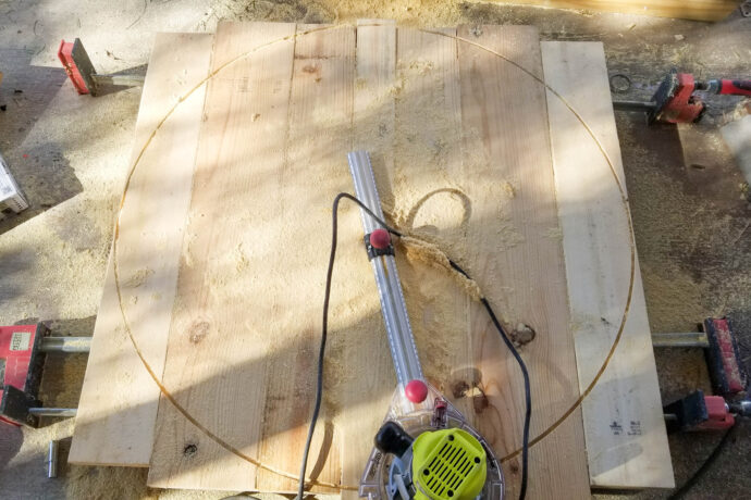 cutting the circle for the axe throwing target with a circle jig for the router