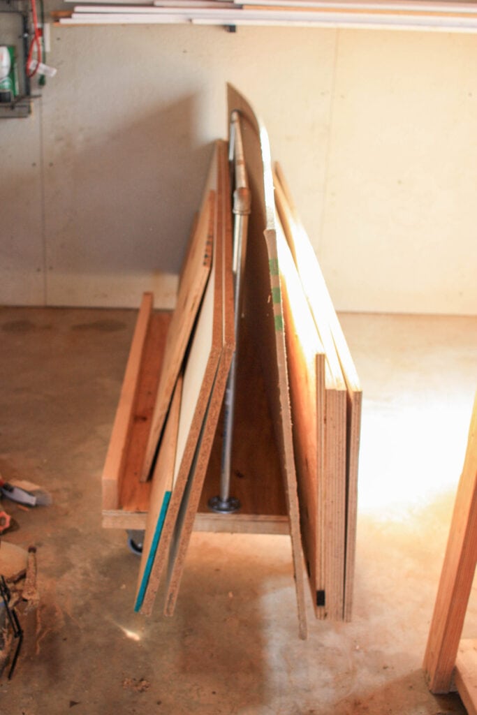 wood cart filled with plywood