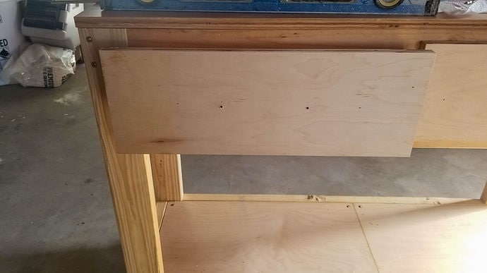 drilled holes for the drawer pulls on the left side table